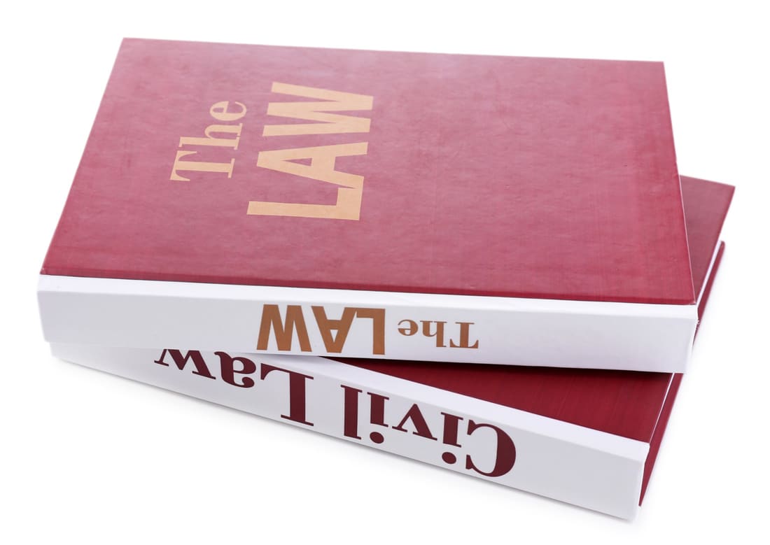 Case-bound hardcover books with printed covers and white spines